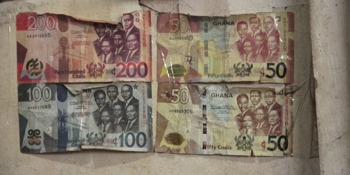 Ghanaian traders count losses as counterfeit cedi notes, fake MoMo alerts surge