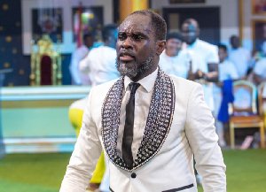‘What is biblical about this?’ - Netizens react to Ogyaba walking on church members’ clothes